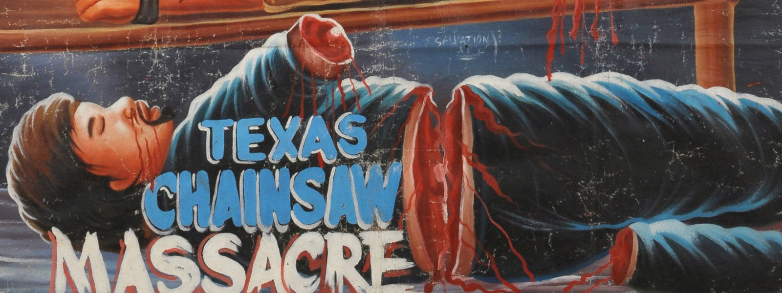 THE TEXAS CHAINSAW MASSACRE MOVIE POSTER HAND PAINTED IN GHANA FOR THE LOCAL CINEMA CLOSE UP