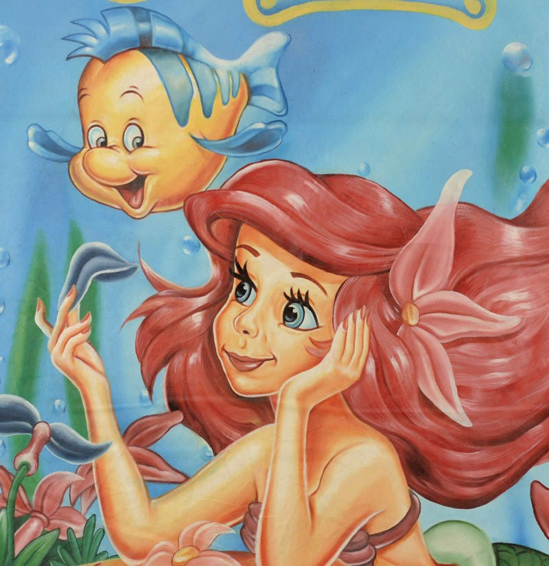 The little mermaid movie poster hand painted in Ghana for the local cinema details